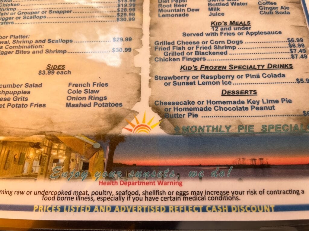 Notice at the bottom of the menu, "Prices listed and advertised reflect cash discount" 